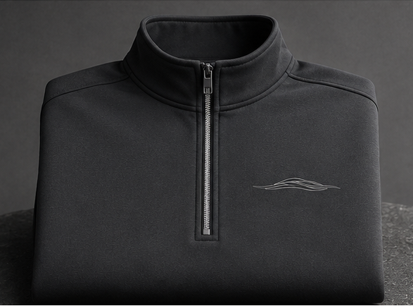 ASYA Coastal quarter zip sweater in a light, breathable fabric, featuring a quarter-length zipper and a casual coastal style.